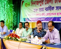 Chamber president Suja ur Rob Chowdhury addressing to the AGM of dinajpur zilla Choul Kol Malik Group as the secretary of the said group.Md Mosaddaque Hussain former President of Dinajpur Chamber Beside him at Bandhan Community Center. 